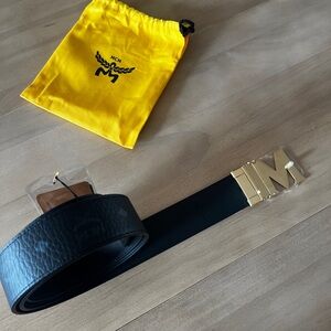MCM Claus reversible belt is crafted with signature monogram coated canvas